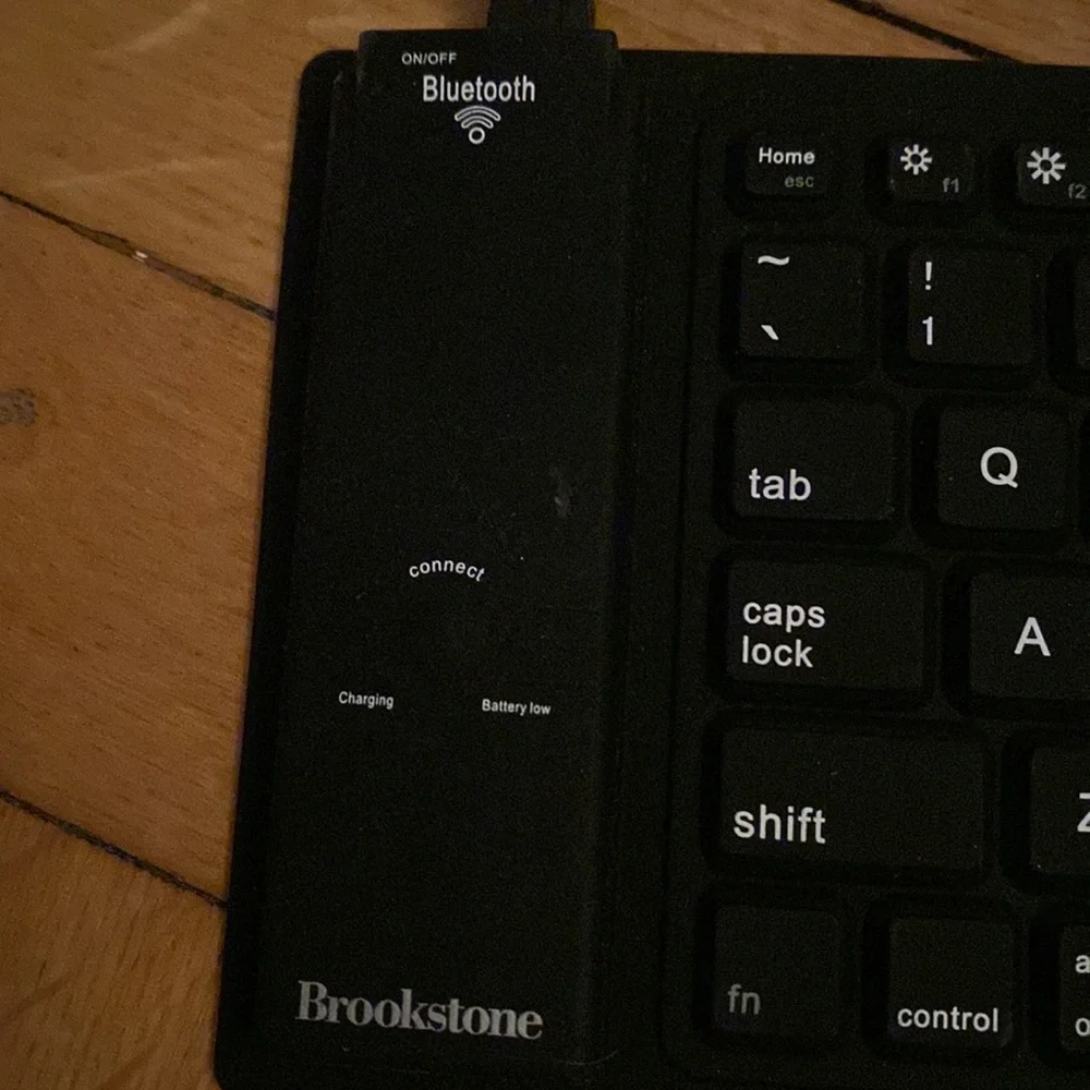 Never used- Brookstone Bluetooth roll up keyboard!